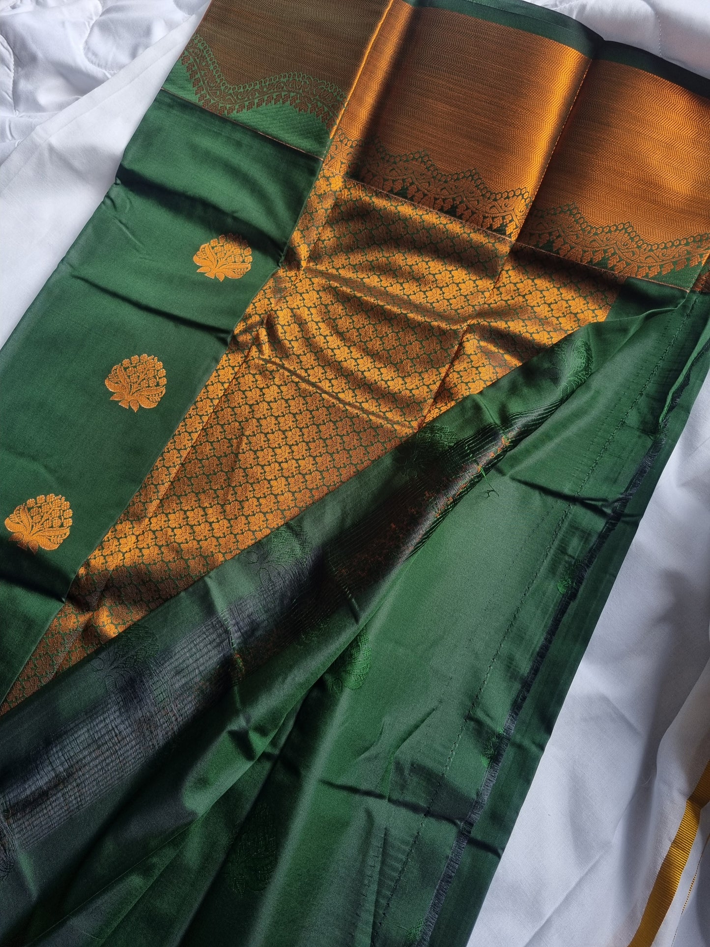Evergreen Green kanchi Semi silk saree